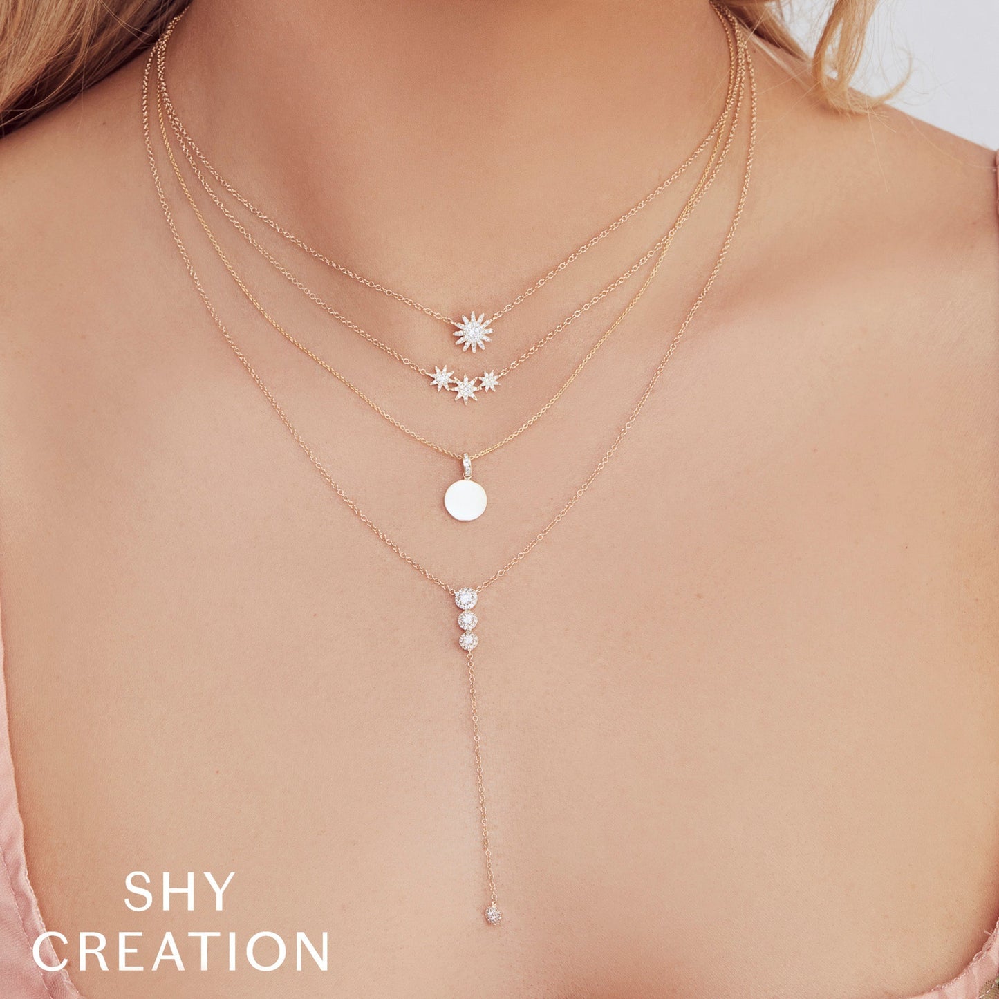 0.15CT 14K Y/G DIAMOND STARBURST NECKLACE