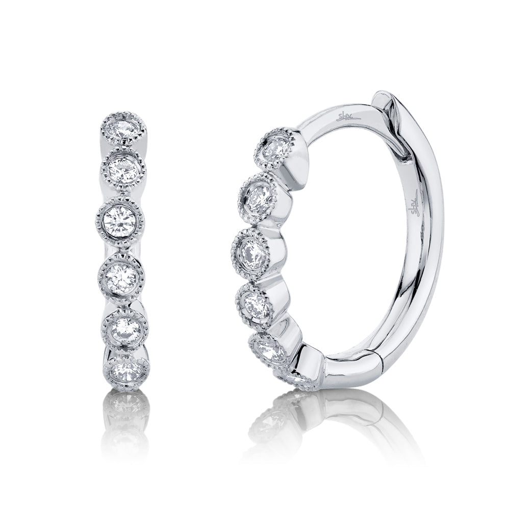 0.11CT 14K W/G DIAMOND HUGGIE EARRING