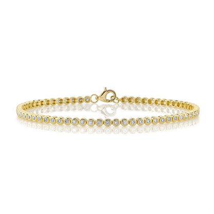 0.64CT 14K Y/G DIAMOND BEZEL TENNIS BRACELET