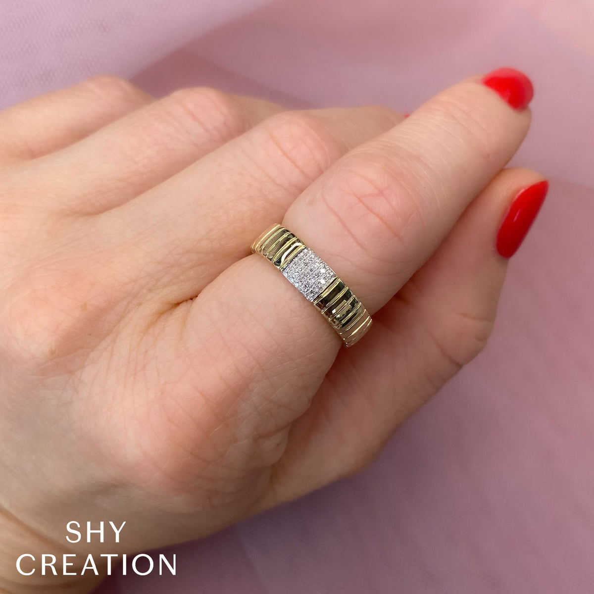 0.08CT 14K Y/G DIAMOND RIBBED BAND