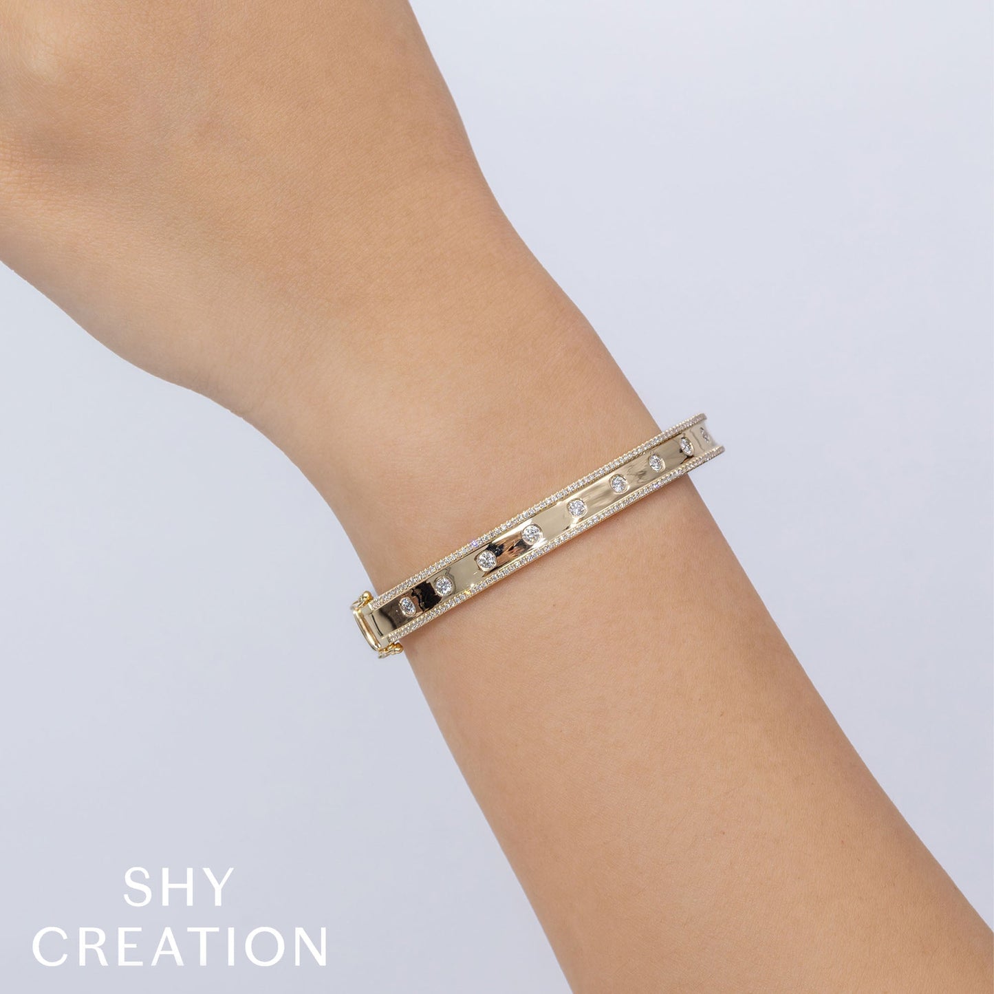 0.97CT 14K Y/G DIAMOND BANGLE