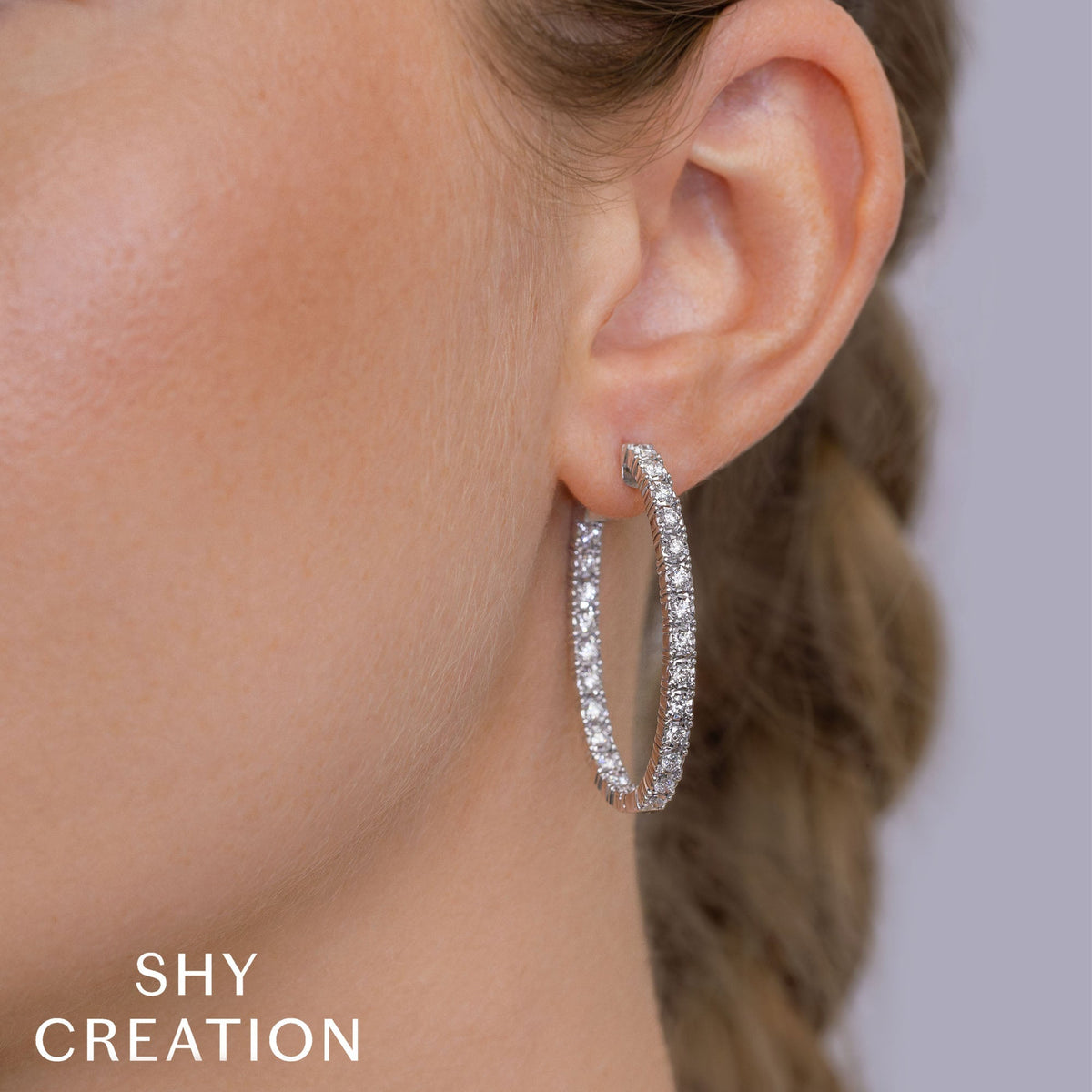 1.50CT 14K W/G DIAMOND OVAL HOOP EARRING