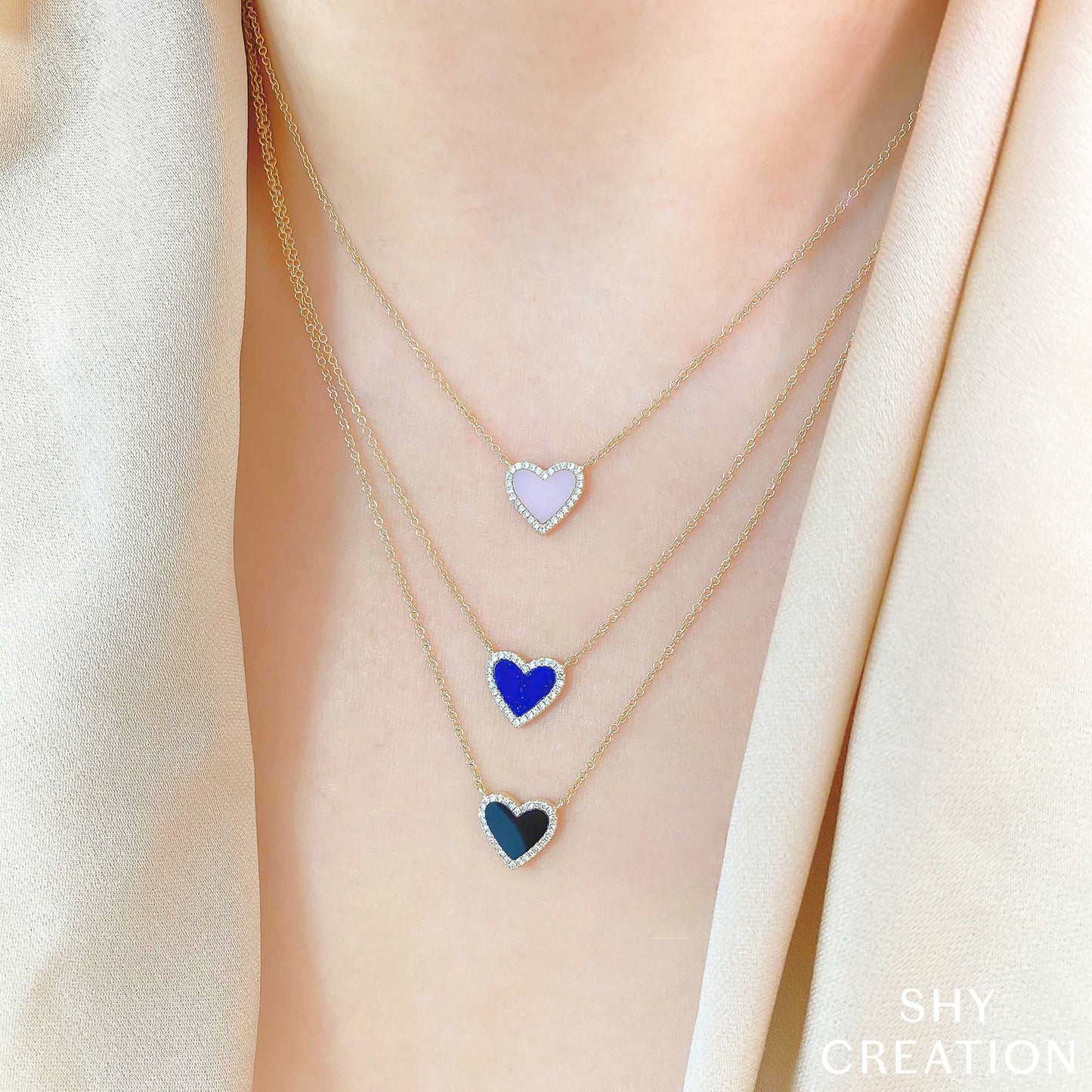0.09CT DIAMOND & 0.54CT LAPIS 14K Y/G HEART NECKLACE