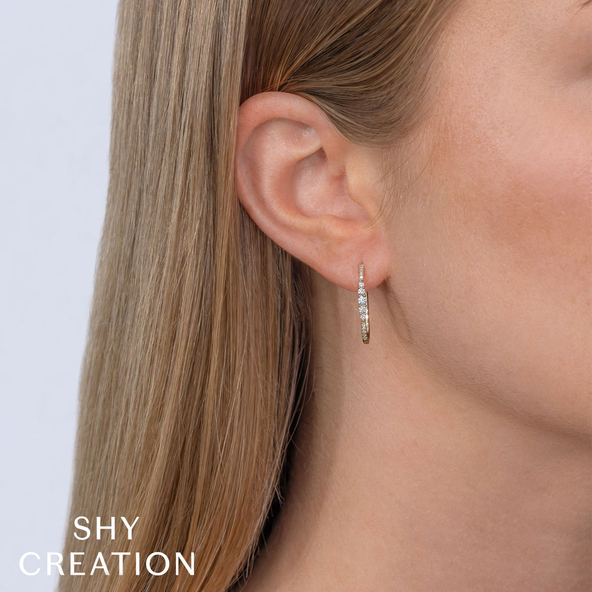 0.29CT 14K Y/G DIAMOND OVAL HOOP EARRING