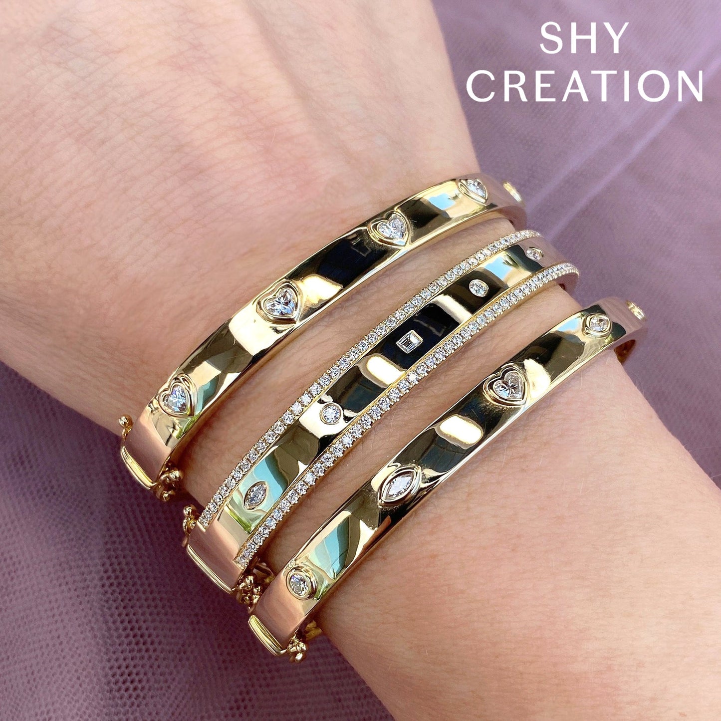 1.08CT 14K Y/G DIAMOND BAGUETTE MARQUISE BANGLE