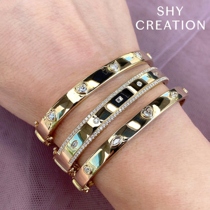 1.08CT 14K Y/G DIAMOND BAGUETTE MARQUISE BANGLE