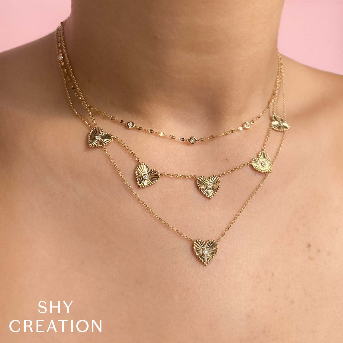 0.02CT 14K Y/G DIAMOND BEZEL RIBBED HEART NECKLACE