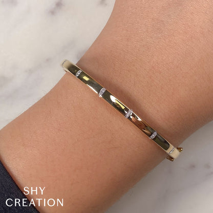 0.09CT 14K Y/G DIAMOND BANGLE