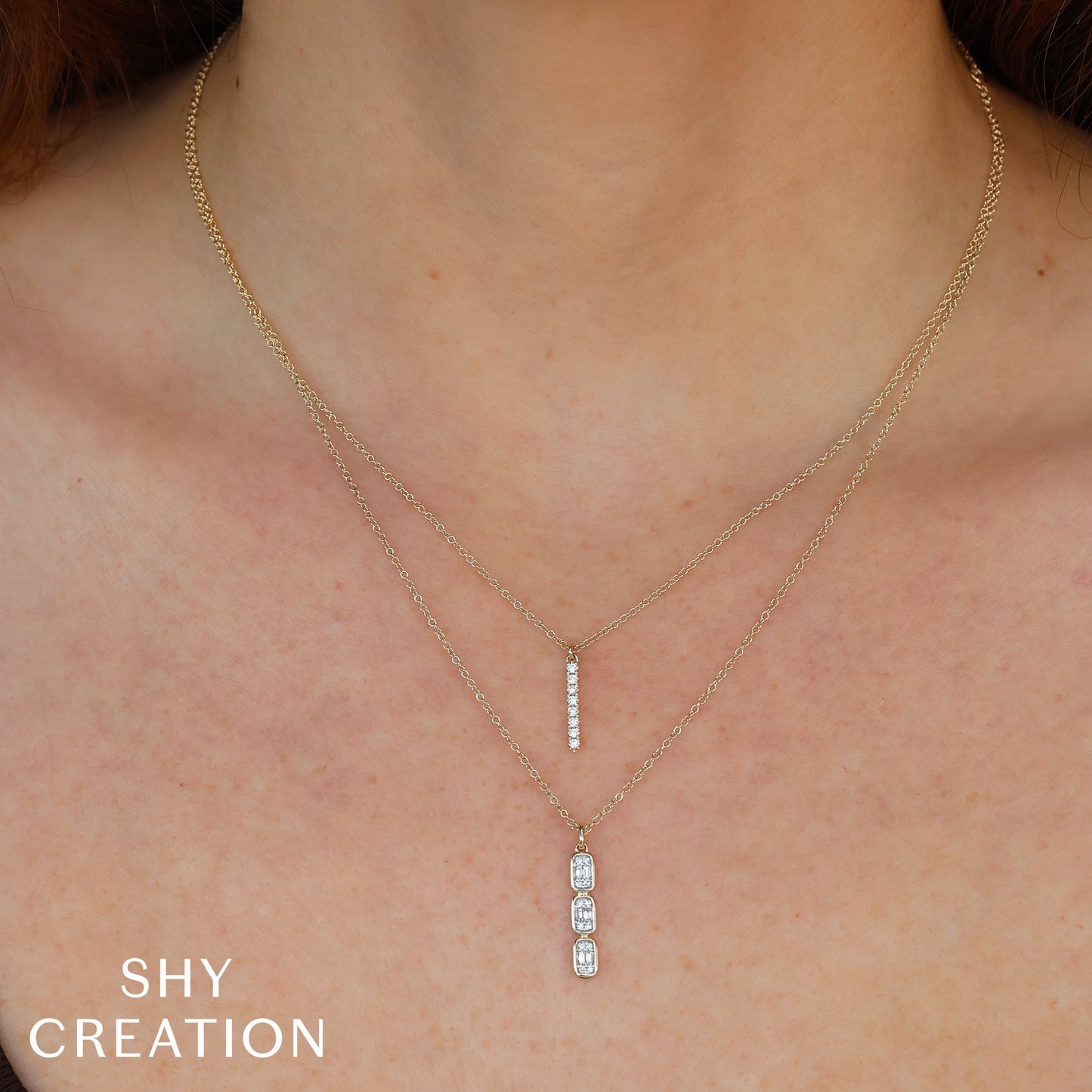 0.14CT 14K W/G DIAMOND BAGUETTE NECKLACE