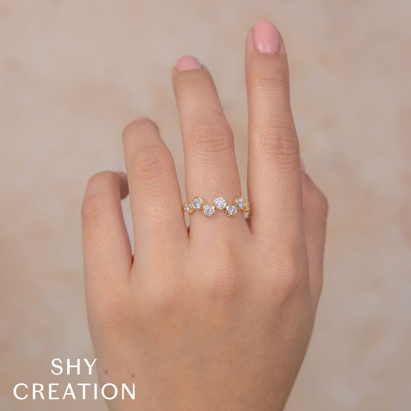 0.78CT 14K Y/G DIAMOND BEZEL RING